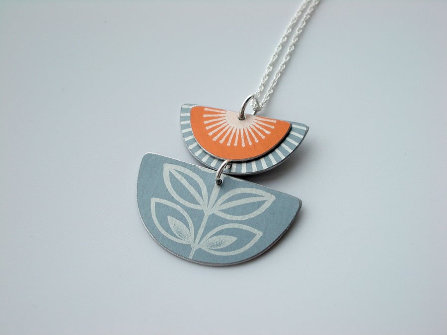 Orange and grey folk art retro style flower pendant