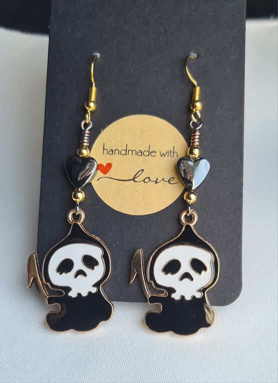 Cute but Grim Earrings - Gold tones