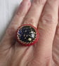 A Red and Gold Ring with a Blue and Gold Centre - Image 4