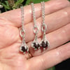 Thames Garnet claw pendant