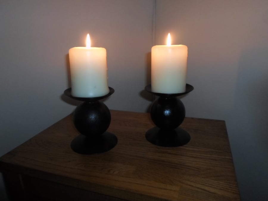 A Pair of Candle Holders............................Wrought Iron (Forged Steel) 