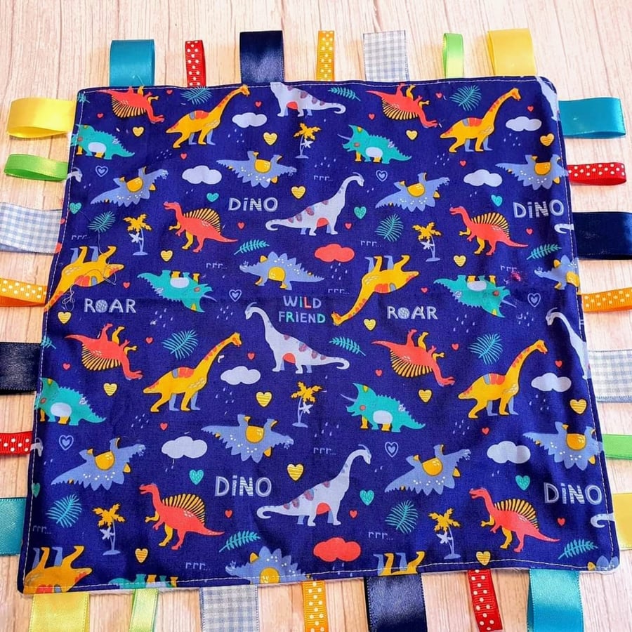 Dinosaur taggy blanket 