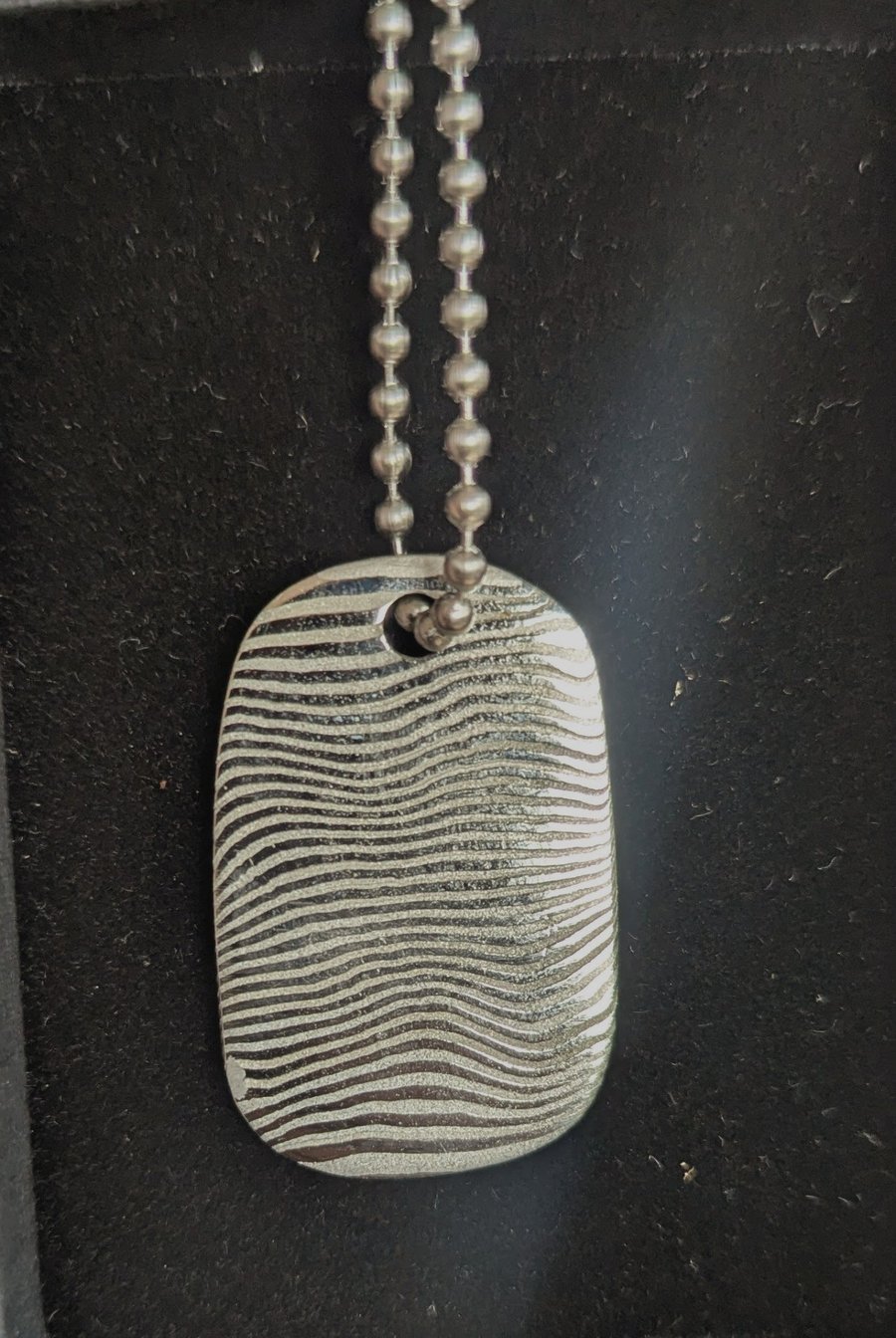 Hand Forged Damasteel Dense Twist™ Dog Tag
