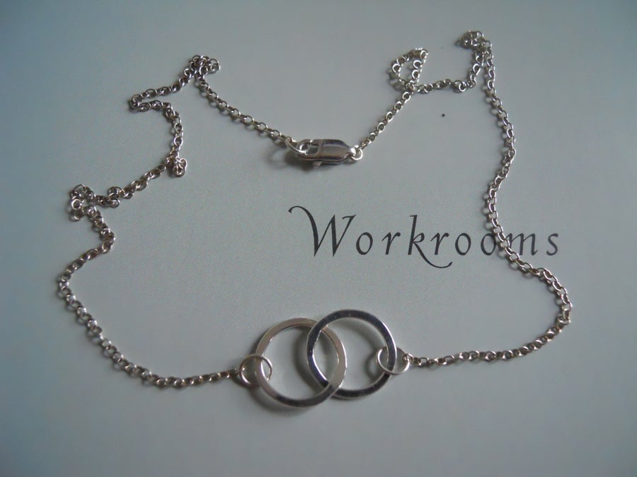 Sterling silver entwined circle necklace