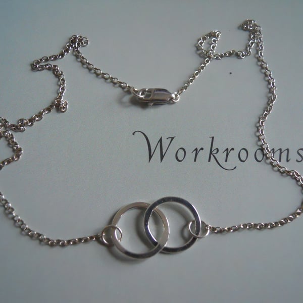 Sterling silver entwined circle necklace