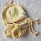 Hand knitted top knot , coming home, babies first hat and bootie gift set