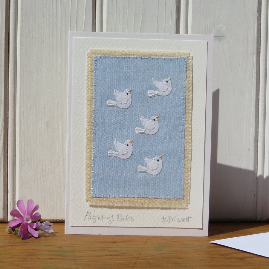 Flight of Doves hand-stitched card, detailed and embroidered with care