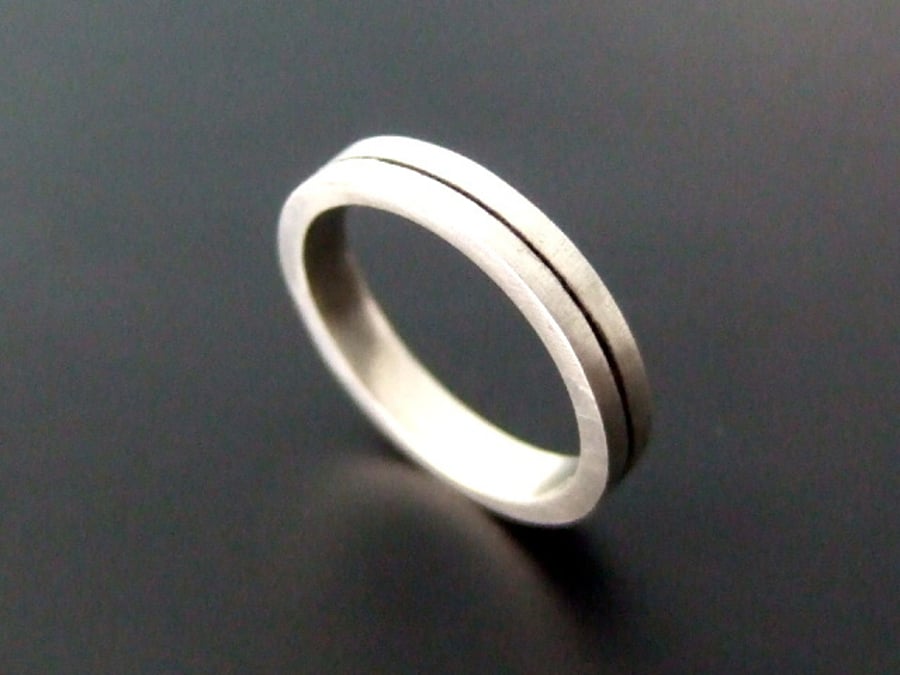 Minimalist black line ring
