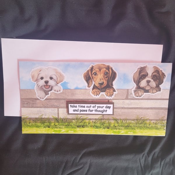 Peeping dogs blank greetings card, puppies