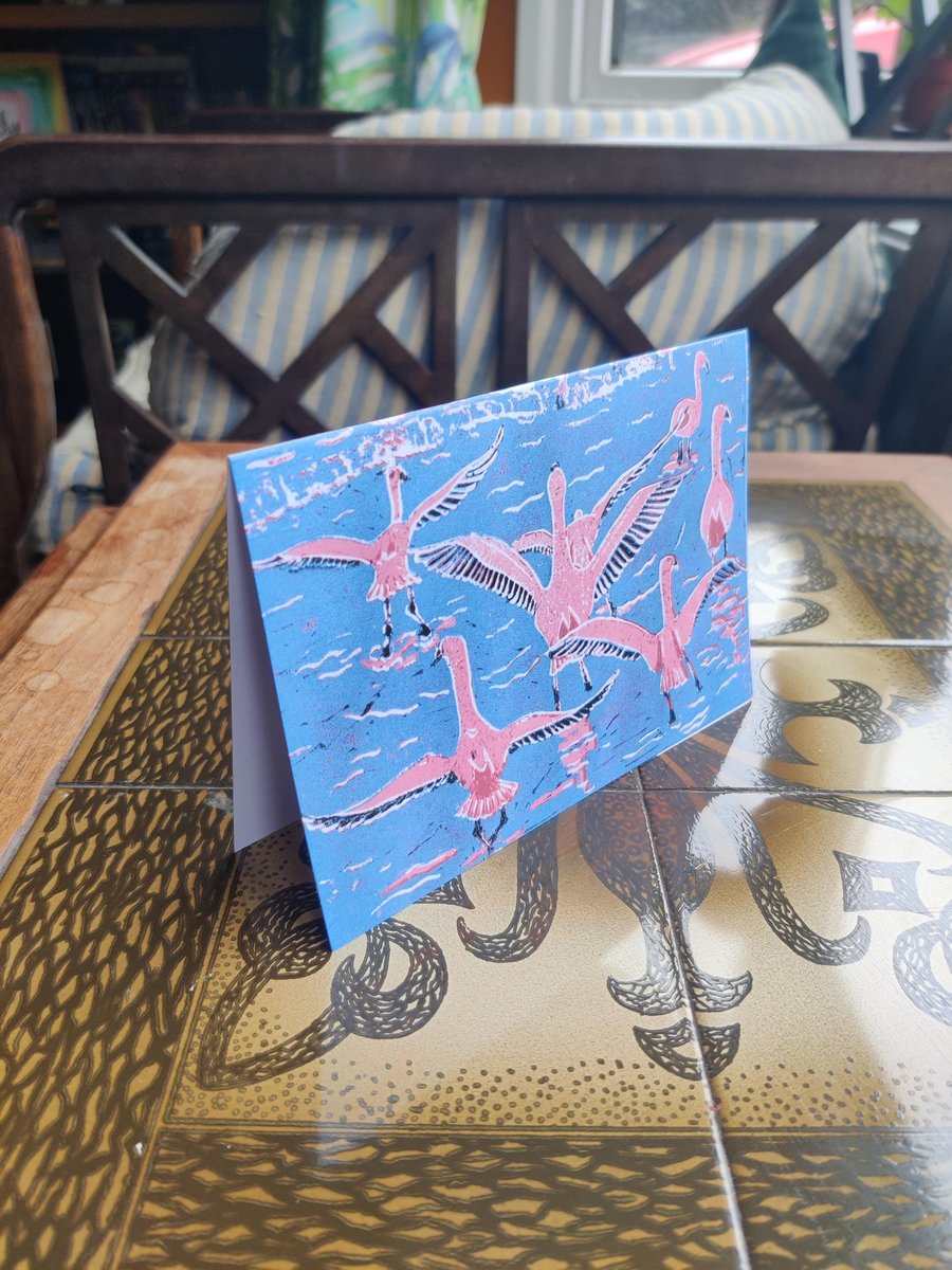 A beautiful reproduction print showing Bolivian  flamingos in a blue lagoon 