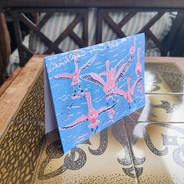 A beautiful reproduction print showing Bolivian  flamingos in a blue lagoon 