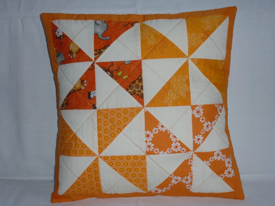 Orange Pinwheel cushion