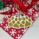 Gold glittered paw print gift tags