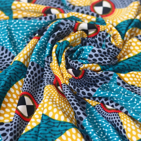 geometric discs lycra african print inspired stretch fabric sold by the yard