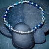 Dainty sterling silver bracelet with Swarovski bicones in blues