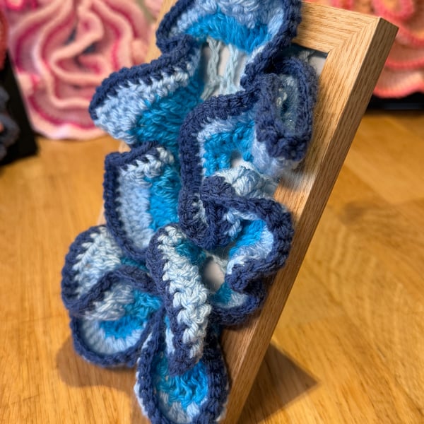 Blue framed crochet art