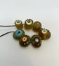 Handmade brown, ivory and turquoise patterned lamp work glass beads - Image 6