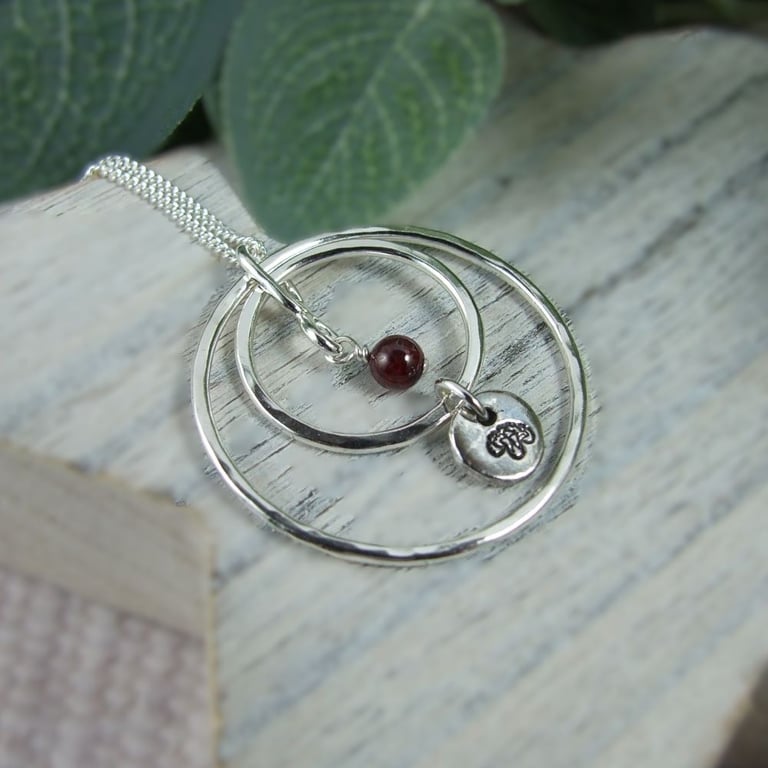 Circles Necklace. Recycled Sterling Silver Pebble with Carnation and Garnet