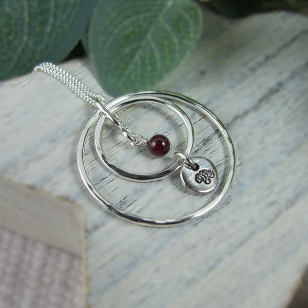Circles Necklace. Recycled Sterling Silver Pebble with Carnation and Garnet