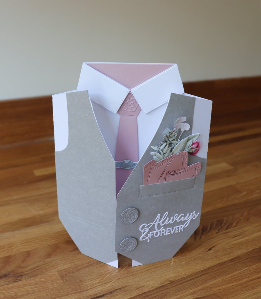 Well Dressed Groom with button hole of Flowers