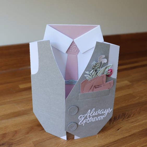 Well Dressed Groom with button hole of Flowers