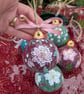 Pink Hellebore (Christmas Rose) hand-painted ceramic Christmas bauble
