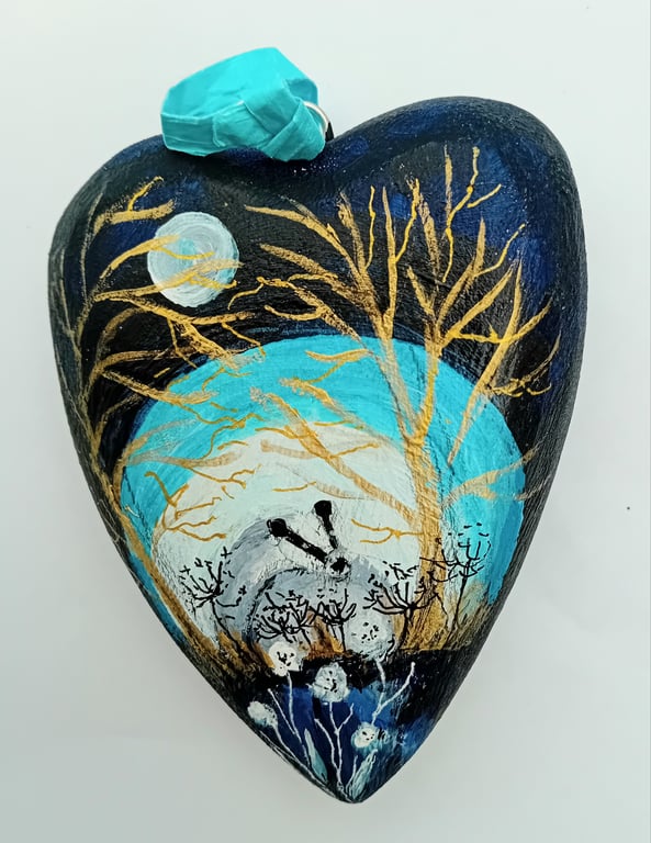 Badger by moonlight. On a chunky wooden heart