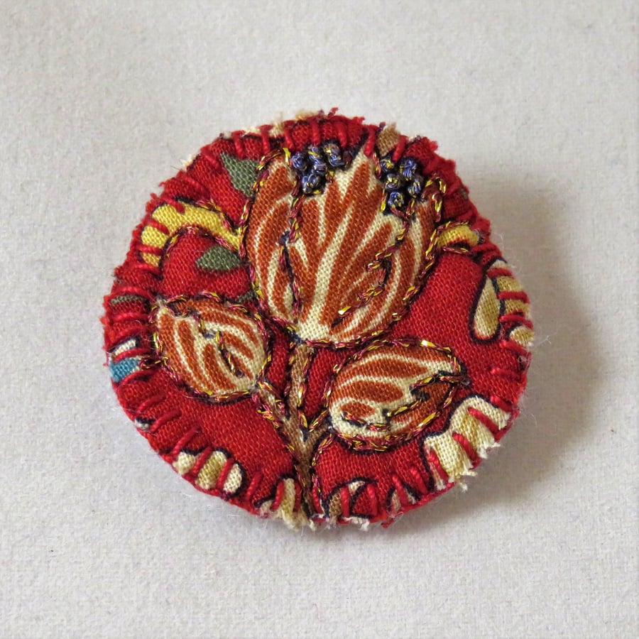 Copper  Flower badge style brooch metallic thread on vintage fabric