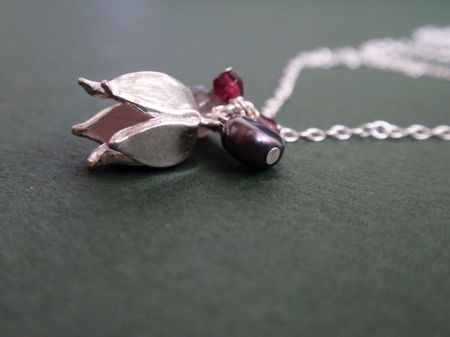 Sterling silver flower necklace with garnet and grey pearl