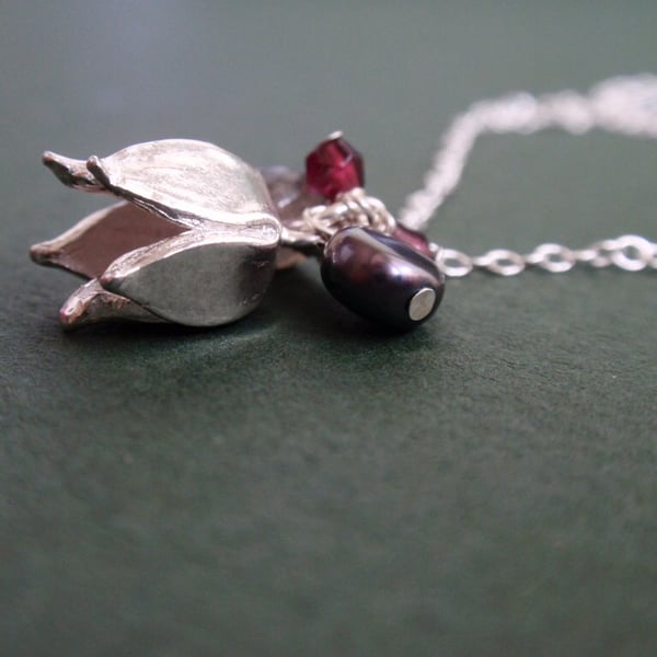 Sterling silver flower necklace with garnet and grey pearl