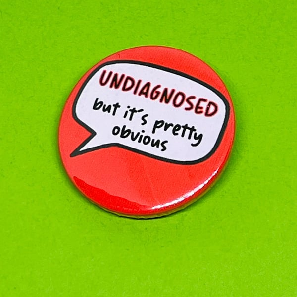 Undiagnosed but it's pretty obvious badge, pocket pebble, magnet or keyring