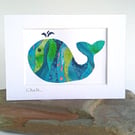 A multicoloured batik 'Whale' fabric picture - 7x5 inches including mount