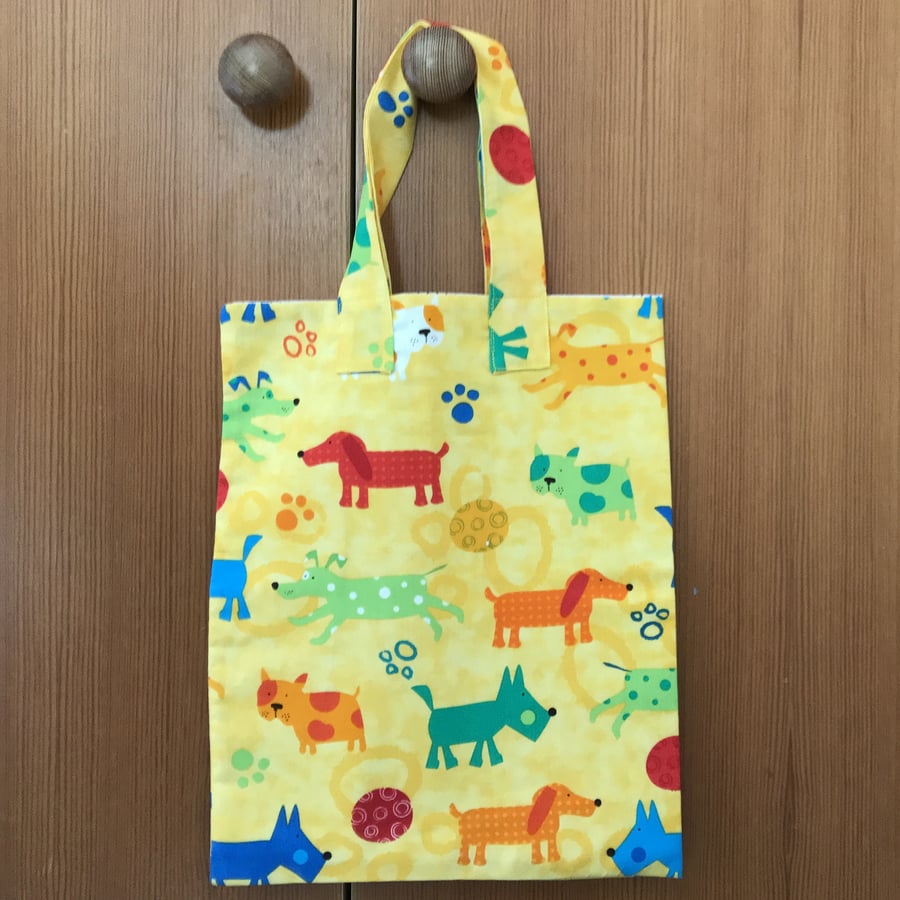 Brightly coloured tote bag with dogs