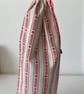 Scandi Style Red and White Drawstring Bottle Bag - Image 9