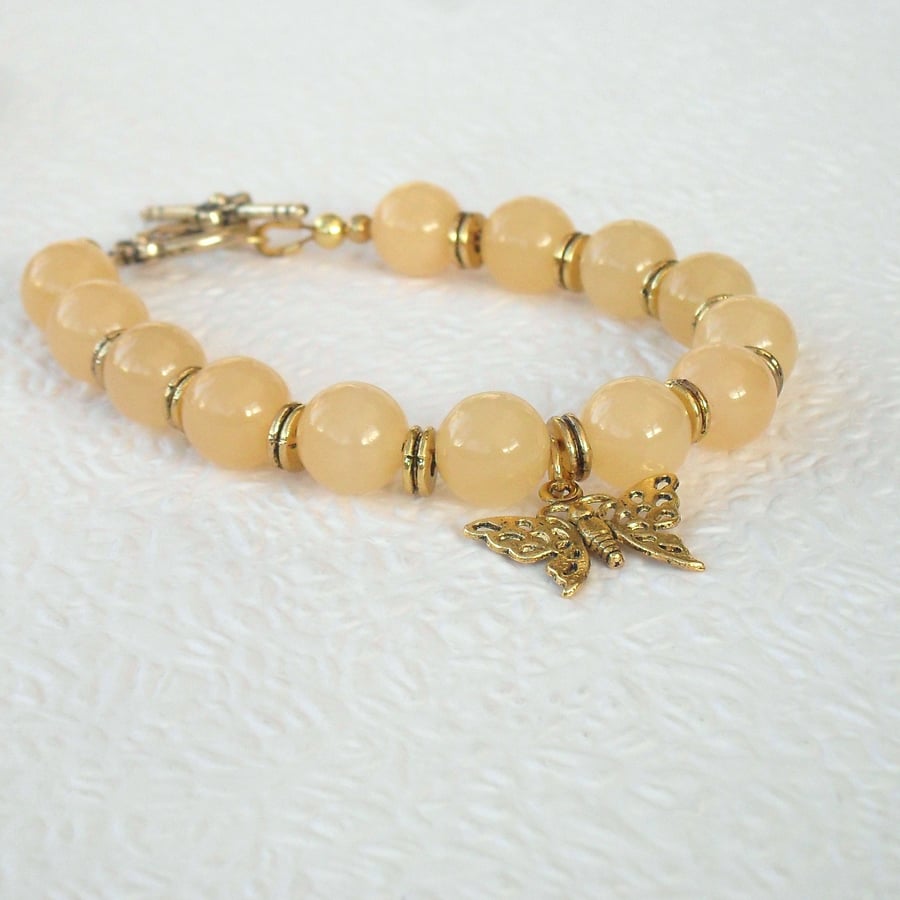 Handmade honey quartz handmade bracelet, with butterfly charm