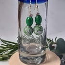 Handmade dangly polymer clay earrings in sparkly green and pink