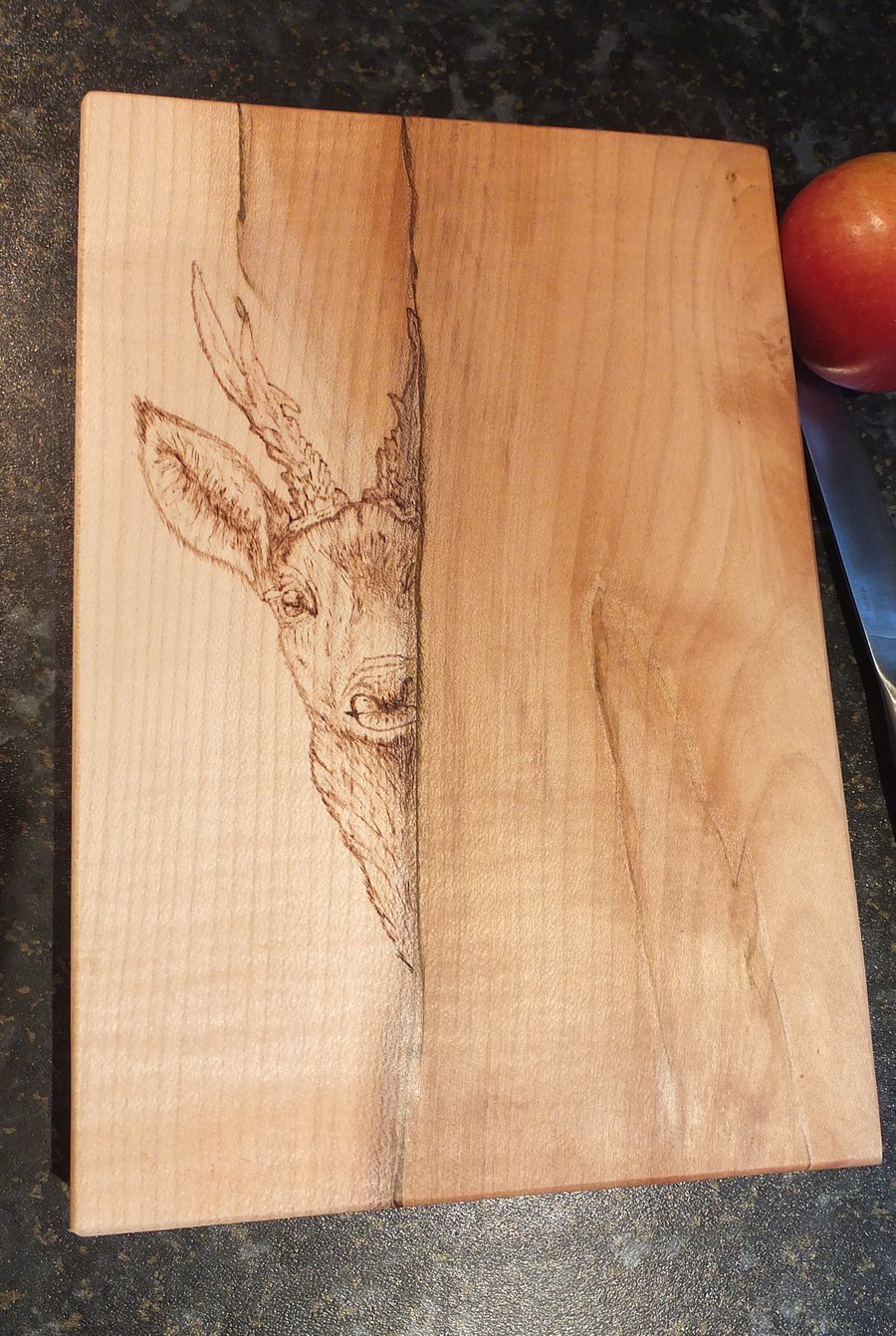 chopping board with peeking deer pyrography. coloured, rippled sycamore. serving