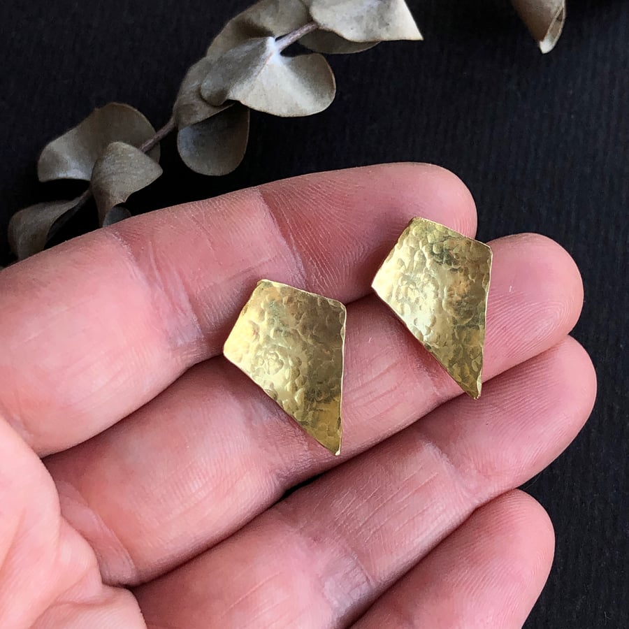 Brass and sterling silver stud earring.