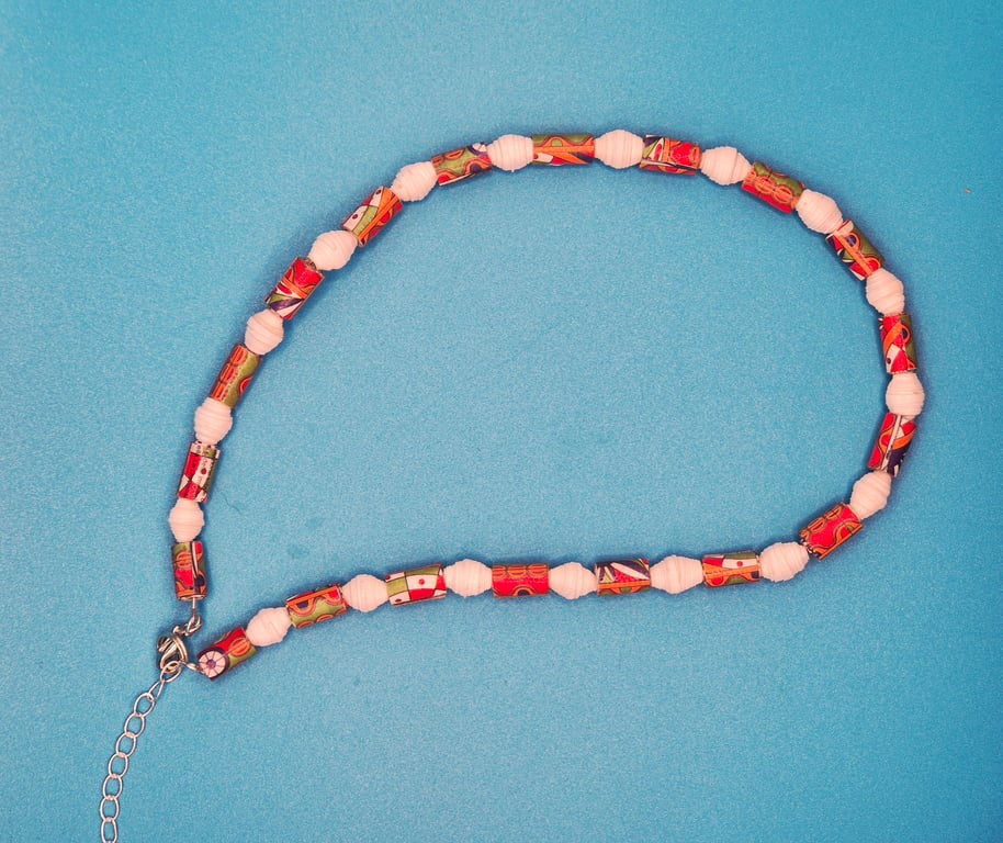 Ras de cou paper beaded necklace with an African inspired pattern