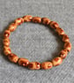Patterned Wooden Barrel Bead Elastic Bracelet - Image 1