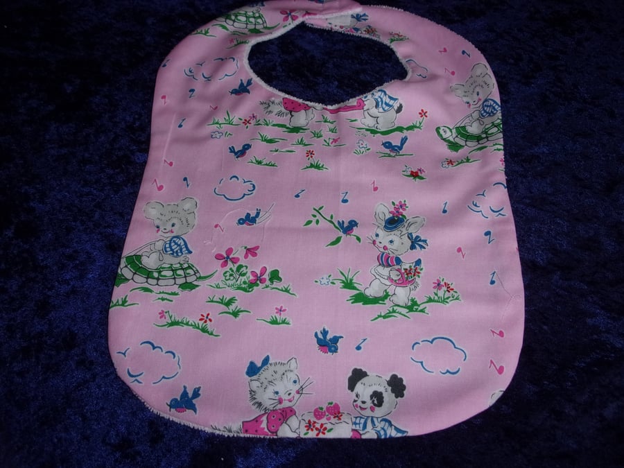 Pink Babies Bib with Playful Animals and Baskets of Flowers