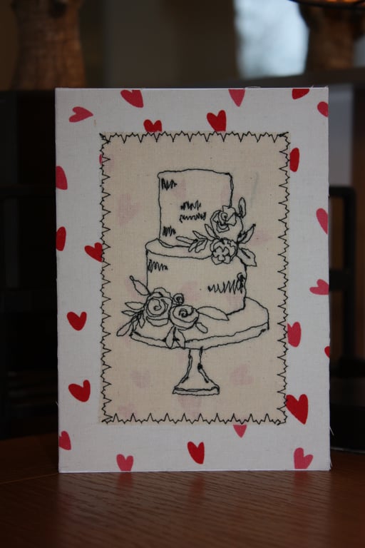 Wedding cake with a heart background