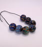 Handmade brown and iridescent lamp work glass beads - Image 9