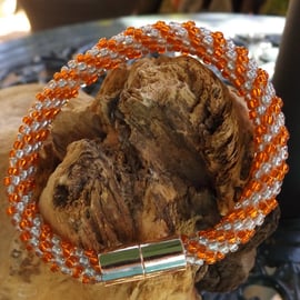 Orange and silver kumihimo bracelet