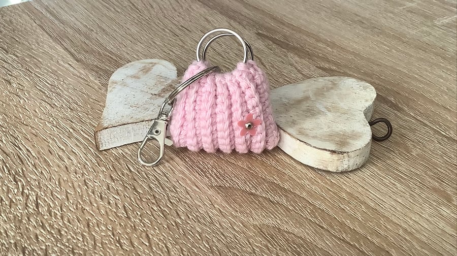 Small bag key, ear buds, spare coin holder