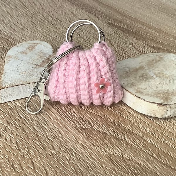 Small bag key, ear buds, spare coin holder