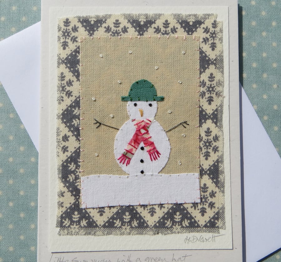 Little Snowman in a Green Hat