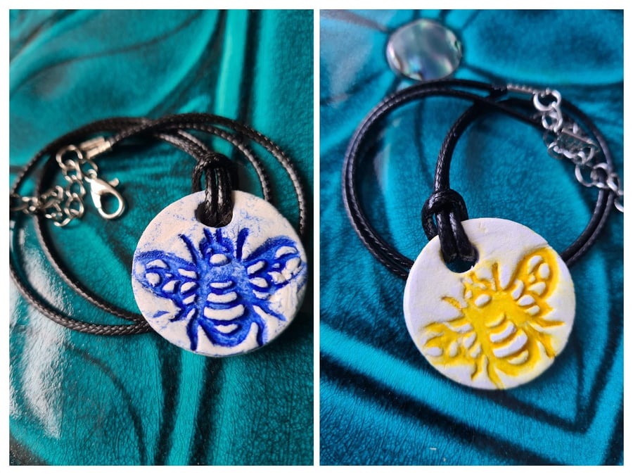 Clay round embossed bee necklace pendant blue or yellow