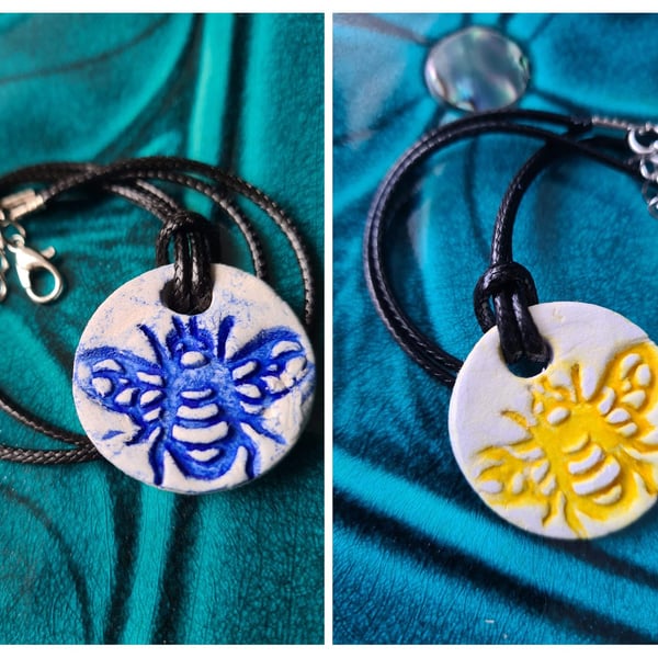 Clay round embossed bee necklace pendant blue or yellow