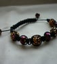 GOLD, RAINBOW IRIS AND BLACK MACRAME BRACELET. - Image 3